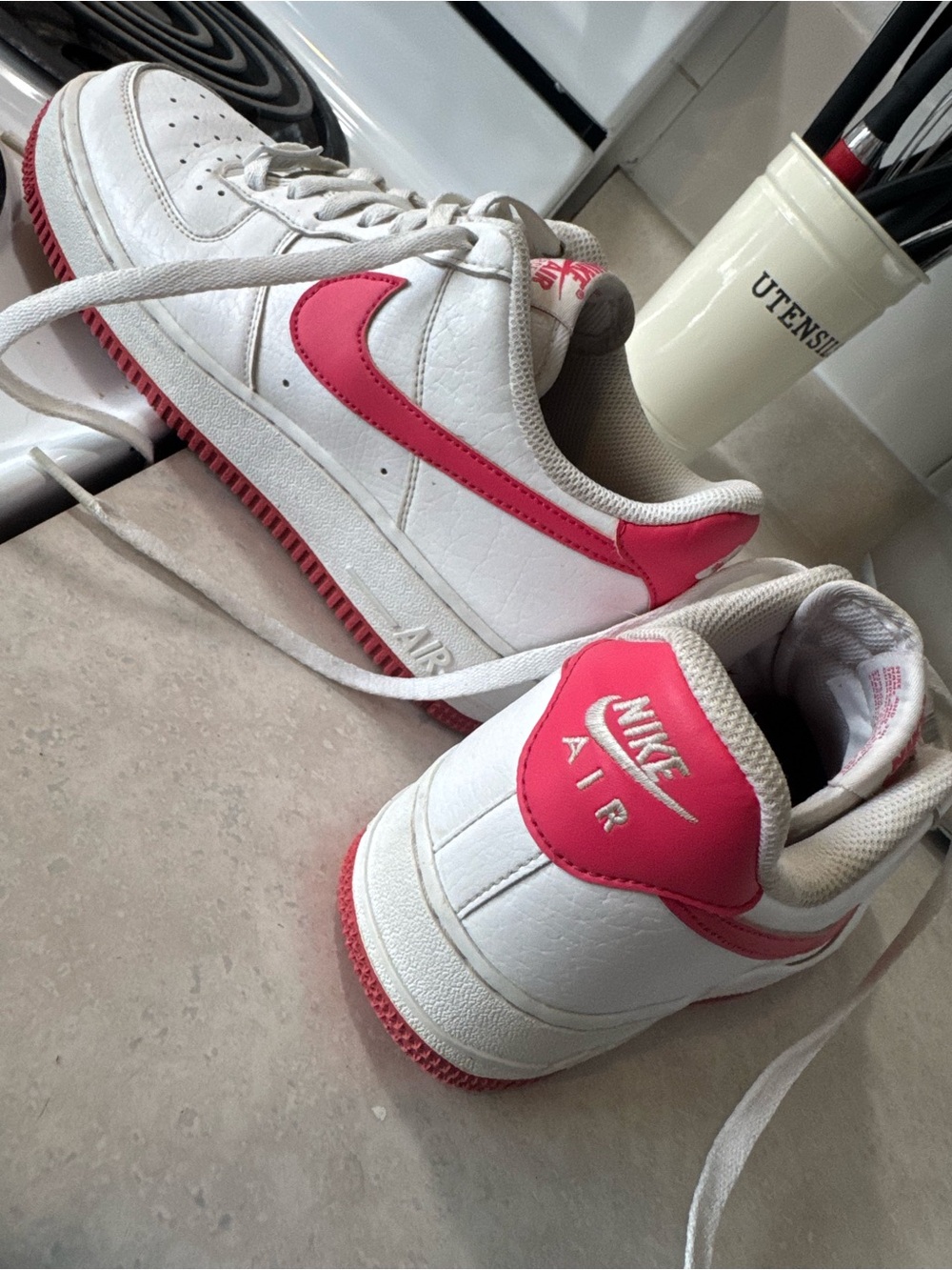 Nike White Sneakers with Pink Swoosh and Accents